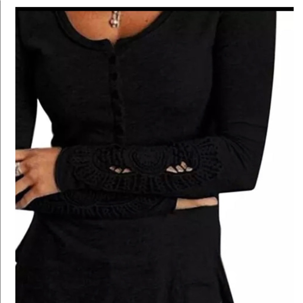 Henley top with crotchet sleeve design.